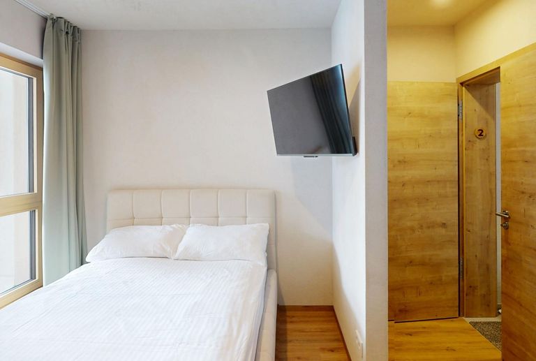 See - Haus - Apartment II - Schlafbereich