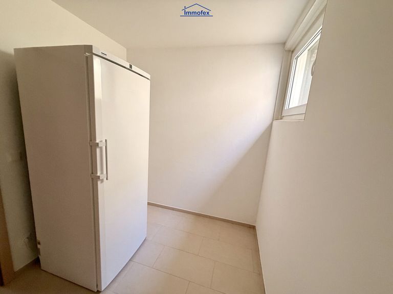 Abstellraum mit Tiefkühler