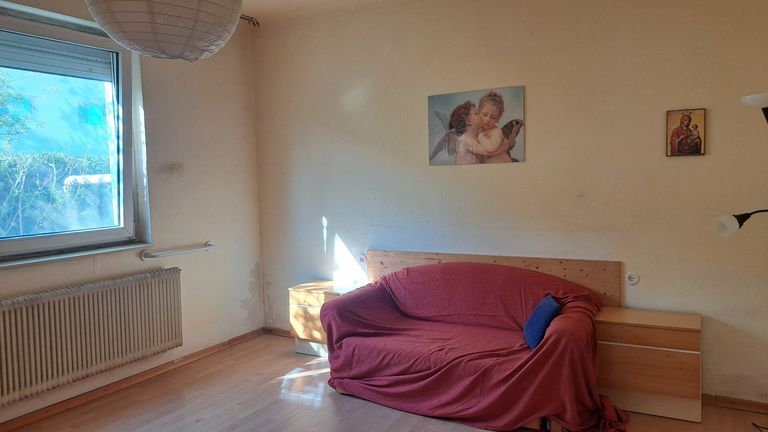 Schlafzimmer 1