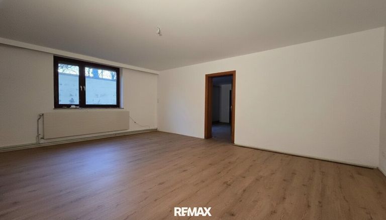 Wohnzimmer mit Küche