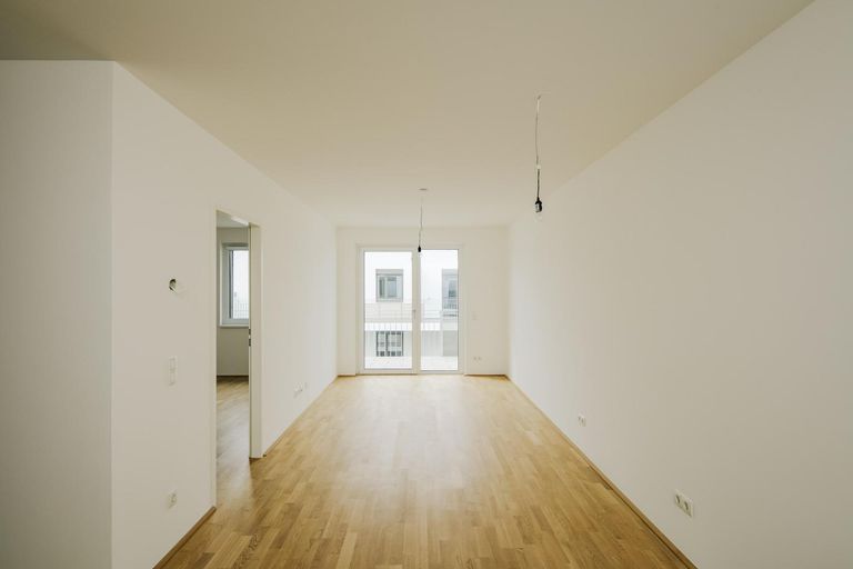 Wohnzimmer mit Ausgang auf die Loggia