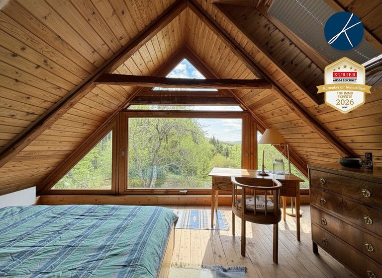 Schlafzimmer mit Panoramafenster...