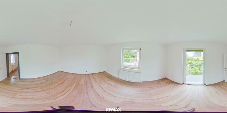 Wohnzimmer mit Ausgang auf die Terrasse