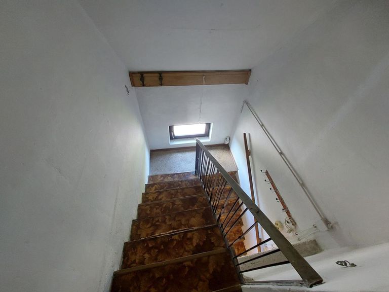 Stiegenaufgang zum Dachboden