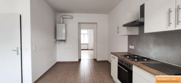 Wohnesszimmer mit Einbauküche