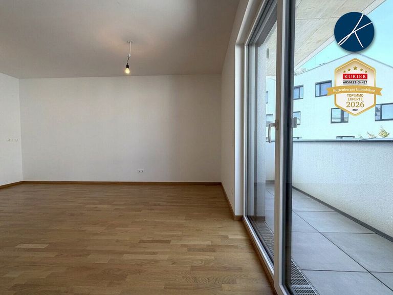 Wohn-/Essbereich mit Ausgang zum Balkon