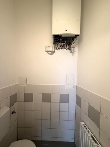 Toilette mit Gasetagenheizung