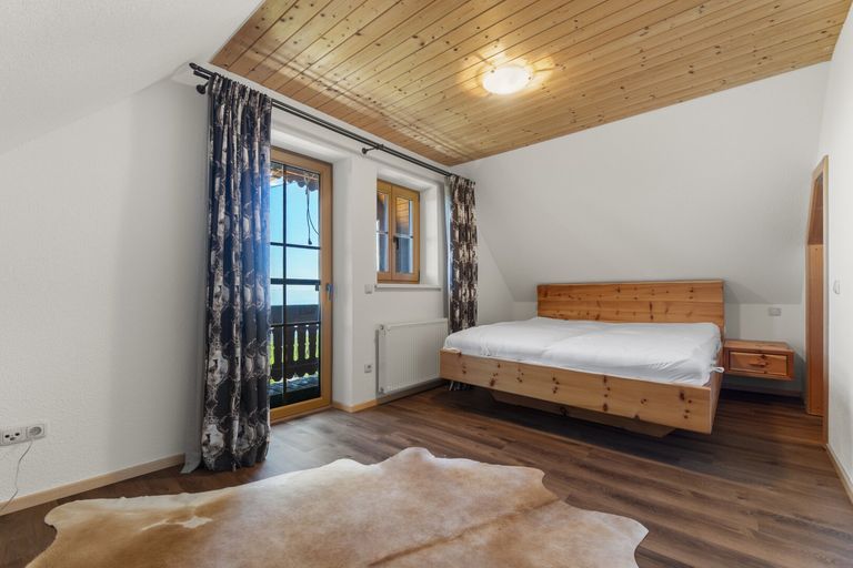 Schlafzimmer mit Balkon