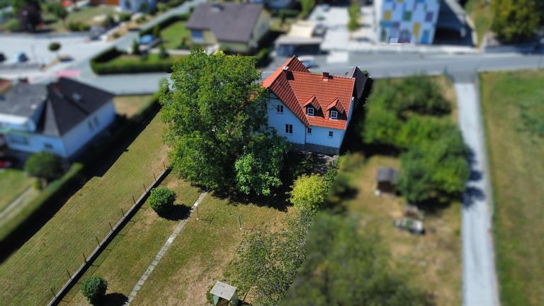 Luftbild Haus mit Grundstücken