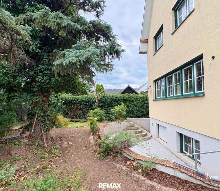 03. Haus Gartenansicht Terrasse