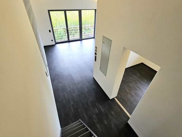 Top 3 Blick auf den Flur und Wohnbereich