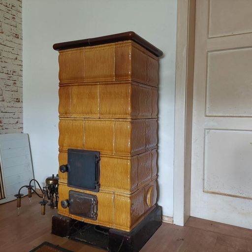 KG Wohnung Kachelofen