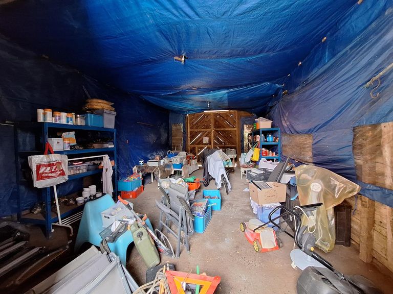 Scheune mit Durchfahrt Richtung Friedhof