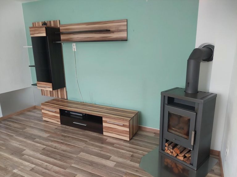 Wohnzimmer mit Ofen