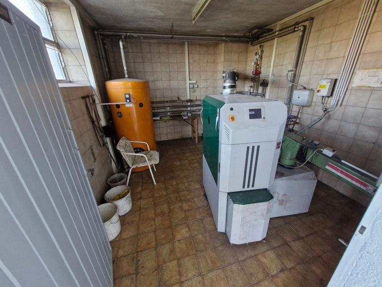 Stallzubau Hackschnitzelheizung für Wohnhäuser