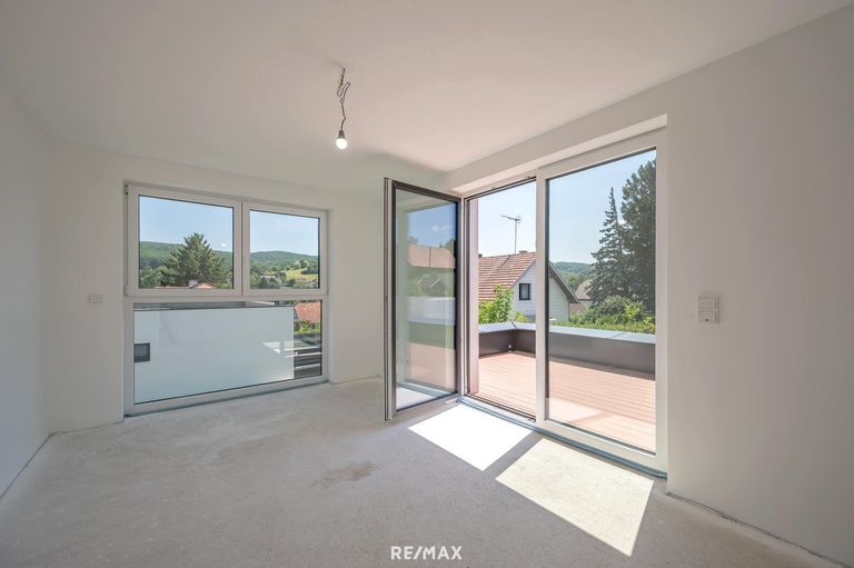 Zimmeroben mit Balkon