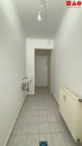 Abstellraum mit Waschmaschinenanschluss