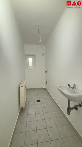 Abstellraum mit Waschmaschinenanschluss