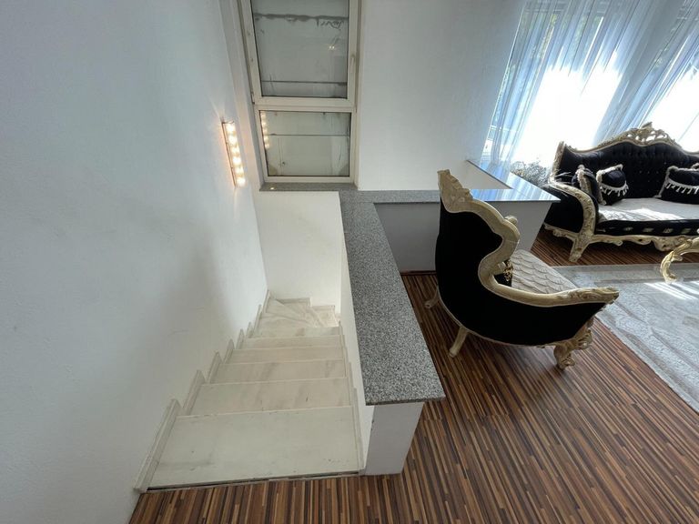 Stiegenaufgang in die Galerie