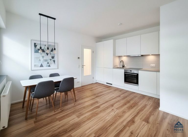 Wohnzimmer mit Kochbereich - Möbel und Dekoration KI-generiert