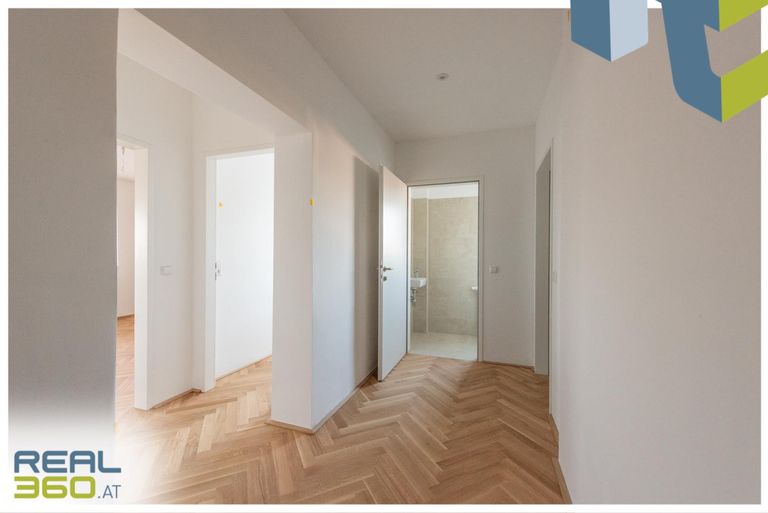 Gang mit Blick in die Zimmer