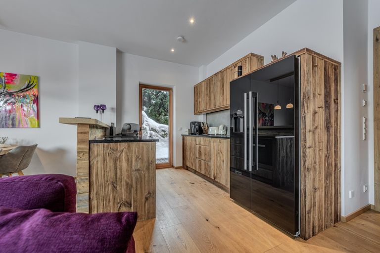 Wohn- Ess- und Kochbereich mit Kamin