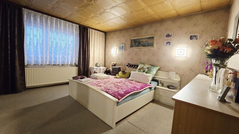 11 Schlafzimmer