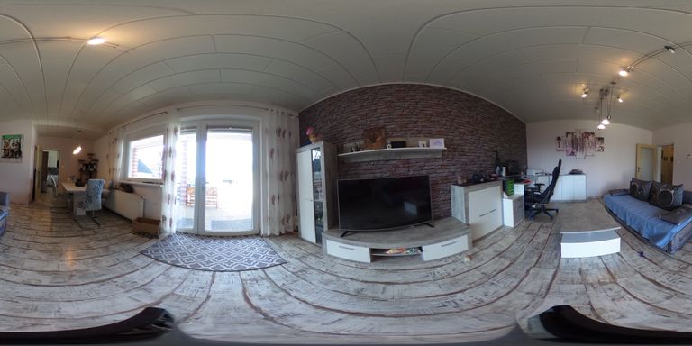 Wohnzimmer mit Ausgang auf die Terrasse