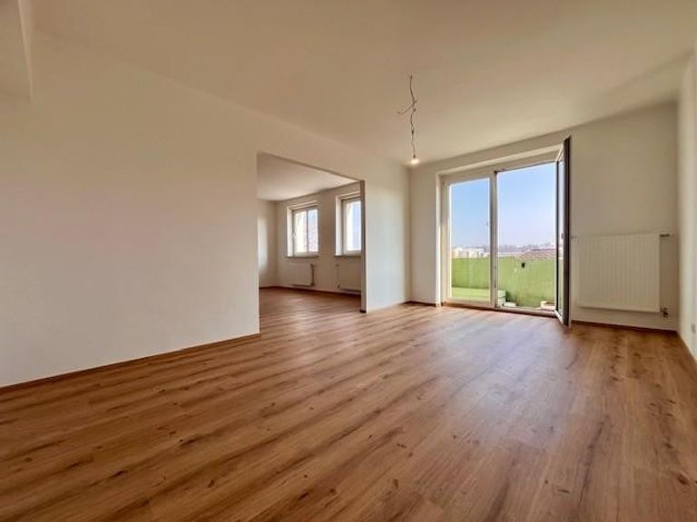 Wohnzimmer mit Balkon