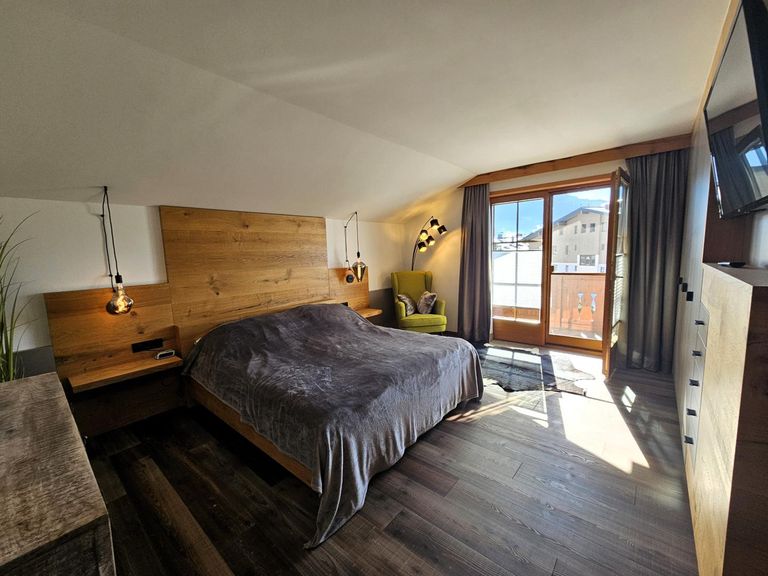 Schlafzimmer mit Balkon