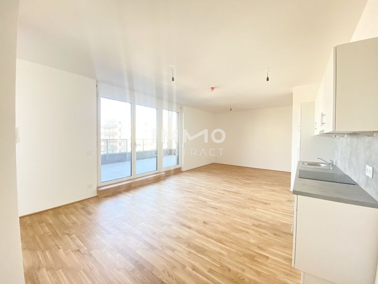 Wohnesszimmer mit Blick zur Terrasse